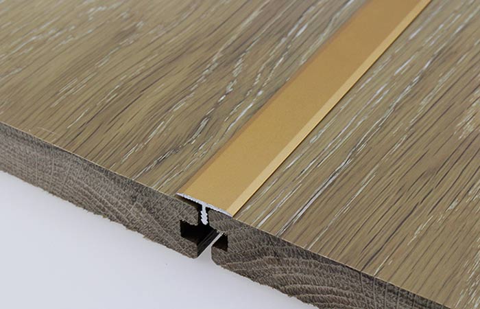Application of aluminium corner protectors T covers